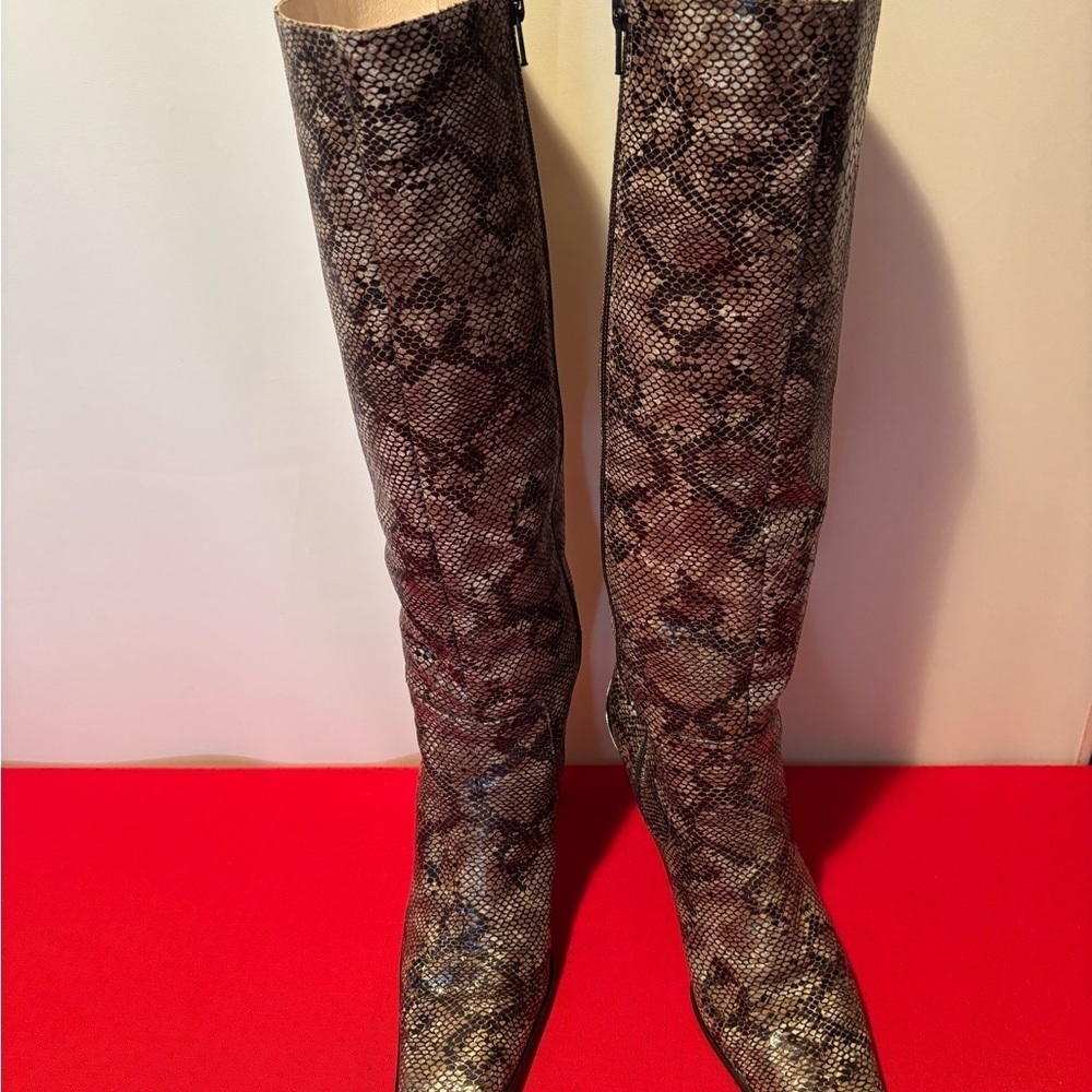 Brown Heeled Boots with Intricate Pattern and Textured Finish